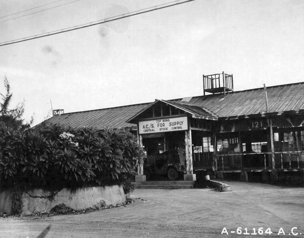 73rd Wing Central Stock Control-some of the buildings used by Japanese garrison at aslito (now Isley) air Field were converted for use as offices and warehouses for B-29 units. Air Corps supply occupied old Japanese Operations Building. Saipan, Marianas Islands. (500th BG)